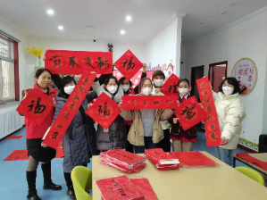 我们的节日——“兔年挥春，福送万家” 桥南街道相杨路社区迎春送对活动